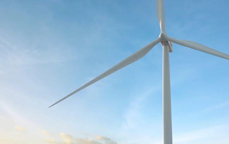 A modern windmill against a blue sky